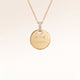 Personalised round gold necklace with white zirconia and engraved initials and date – room for text, coordinates or handwriting on the front and back