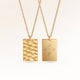 Personalized square gold necklace with rippled wave surface and space for engraving of text, coordinates or handwriting on the back