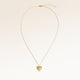 Heart-shaped necklace in gold fully laid out with fine adjustable gold chain and minimalist heart pendant for personalized engraving.