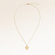 Full heart-shaped necklace in gold fully laid out with fine adjustable gold chain and minimalist heart pendant for personalized engraving