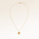 Heart-shaped necklace in gold fully laid out with fine adjustable gold chain and minimalist heart pendant for personalized engraving.
